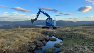 Blue digger restoring a peatland