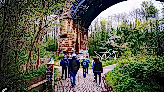 People walking under a viaduct in Ouseburn, Newcastle